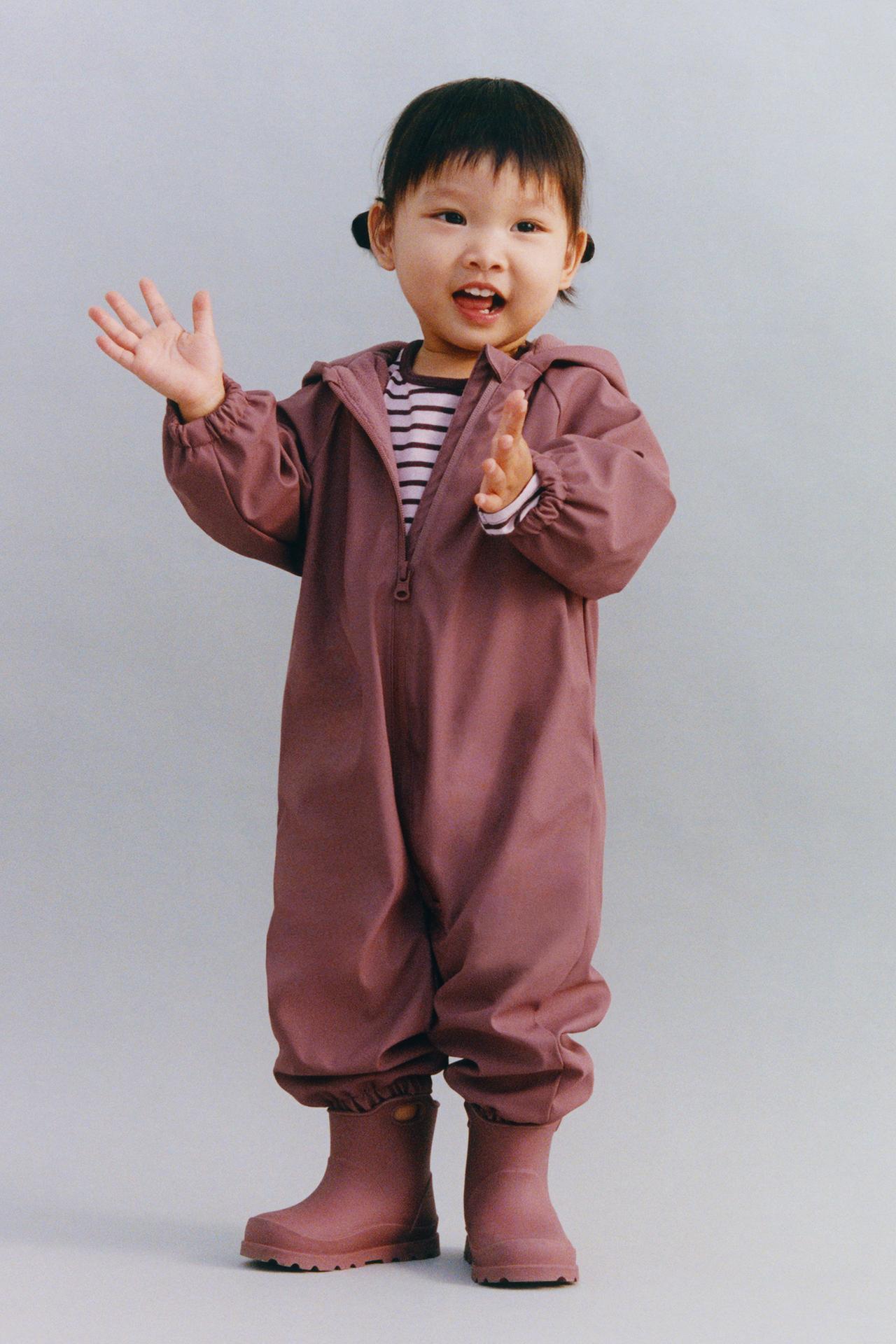 WATER-RESISTANT FLORAL RUBBERIZED JUMPSUIT — Plum