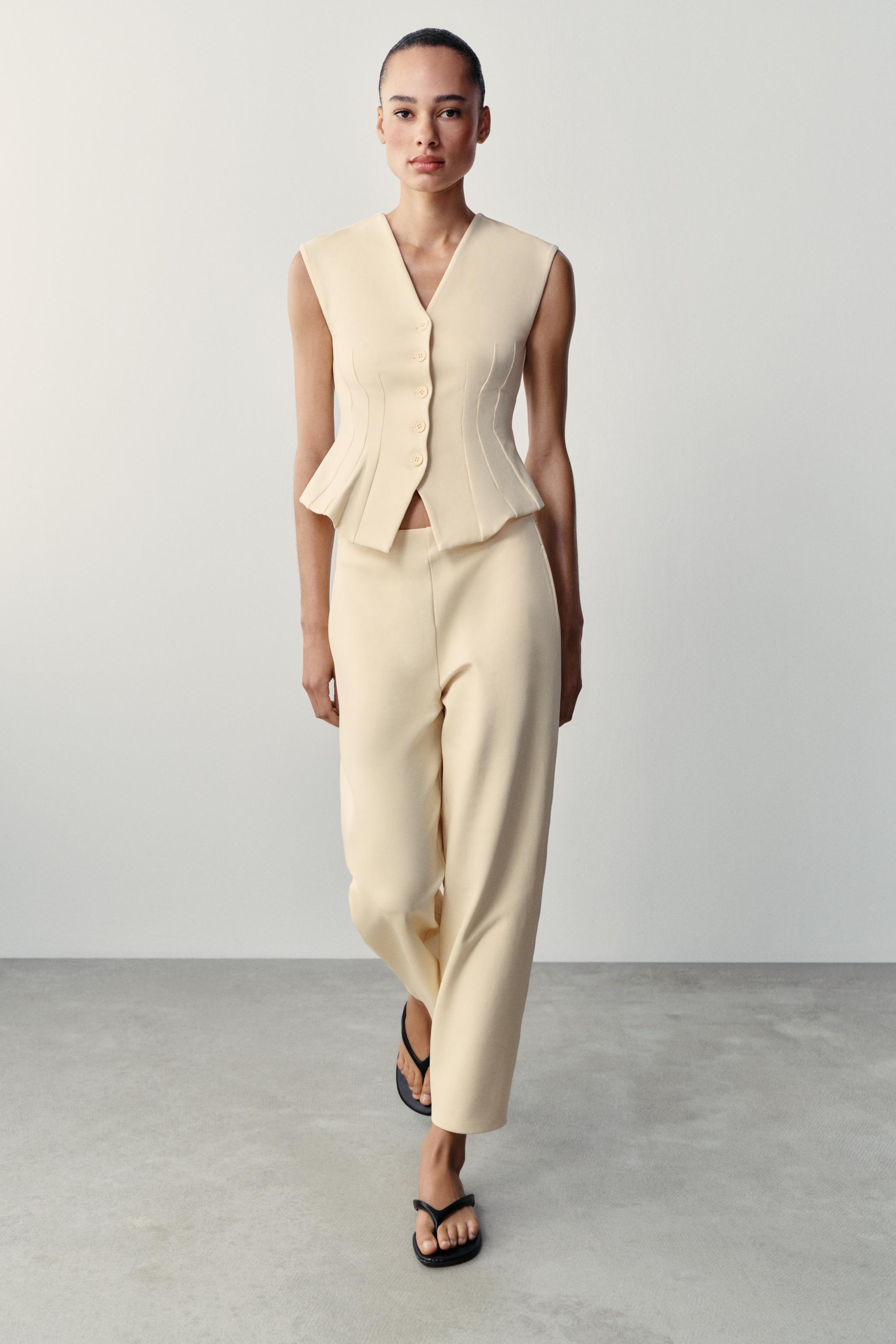 INTERLOCK BUTTON VEST — Yellow