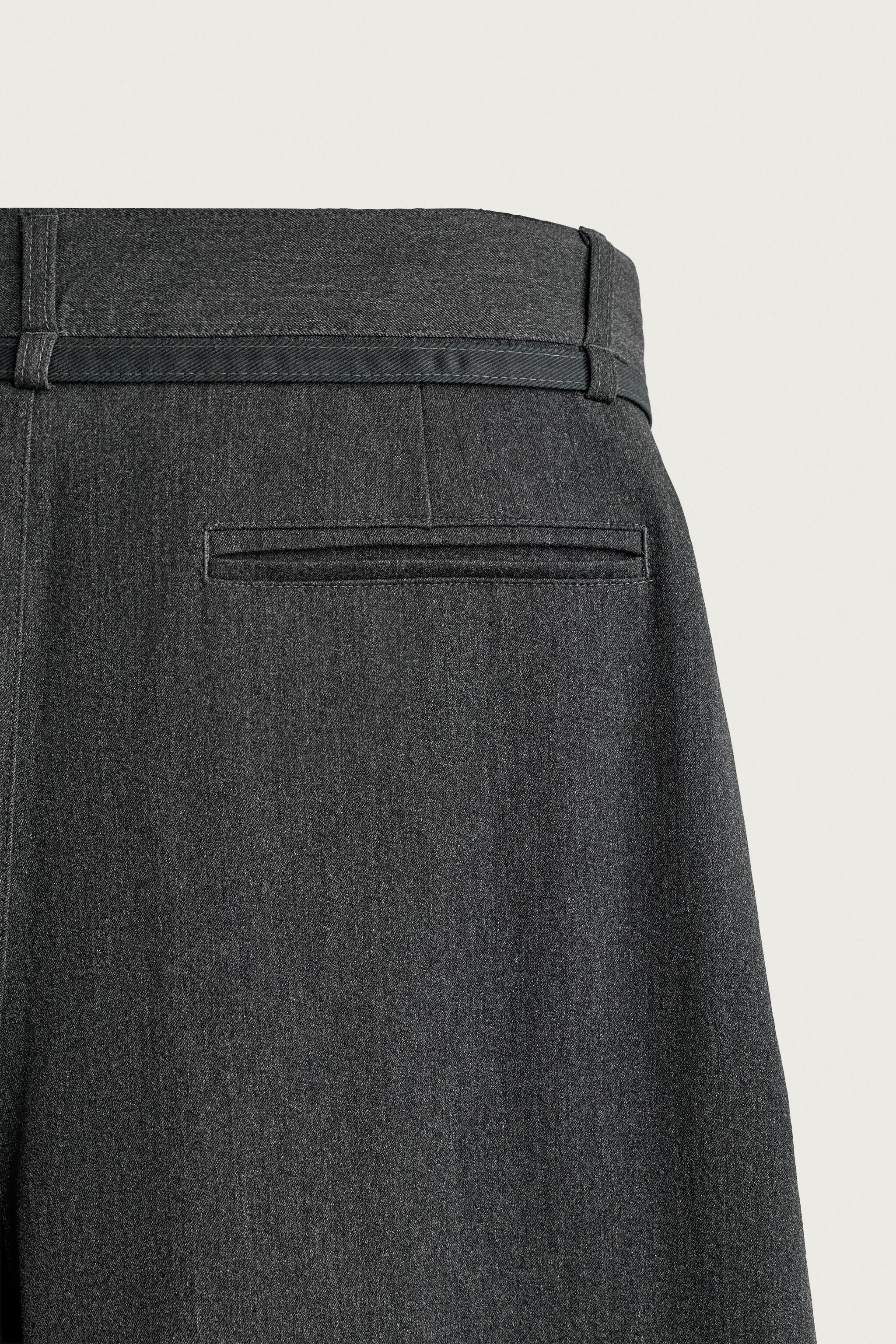 BELTED PLEATED BALLOON FIT PANTS
