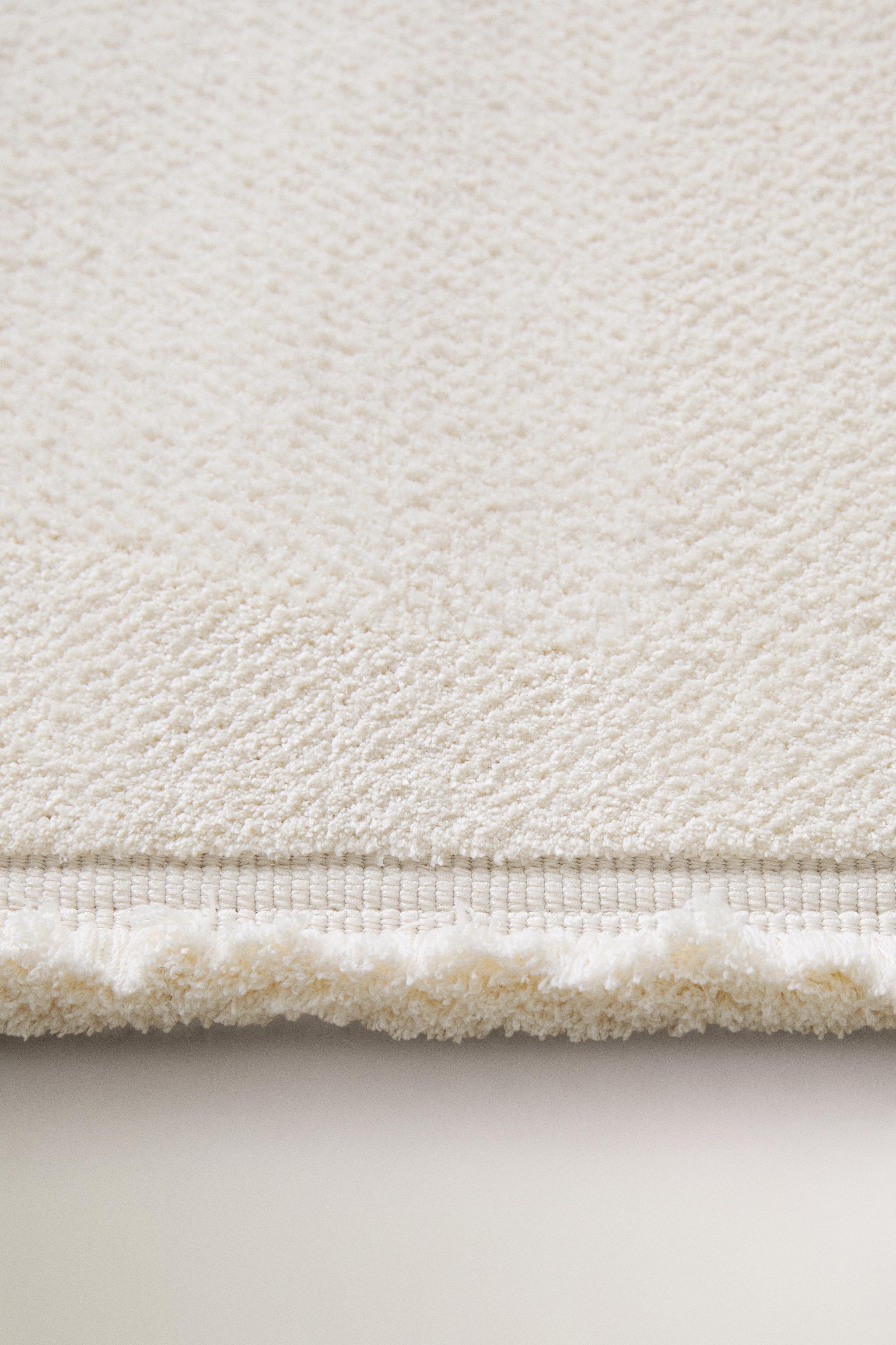 TAPIS FRANGES