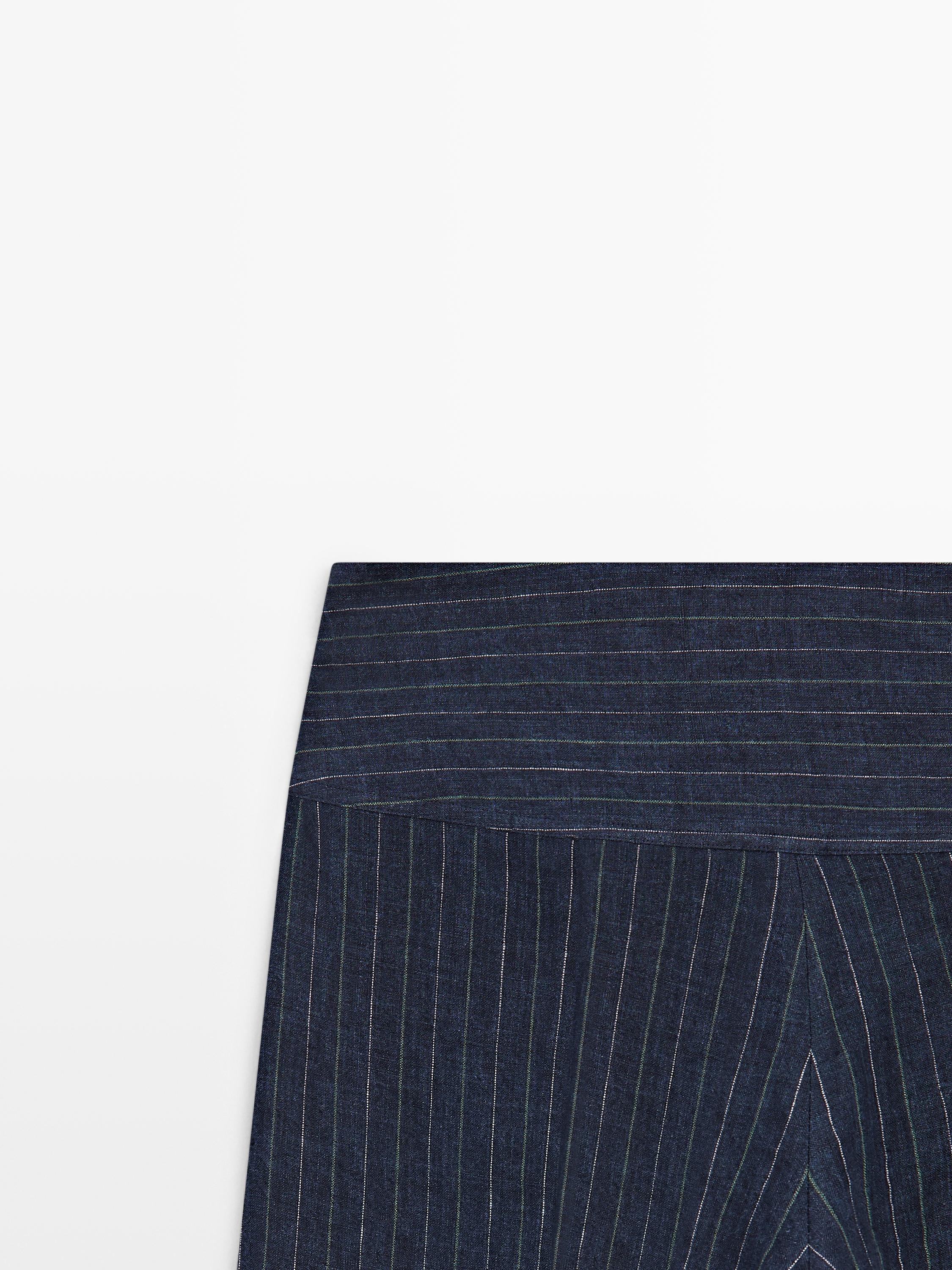 Flare fit linen trousers with striped details