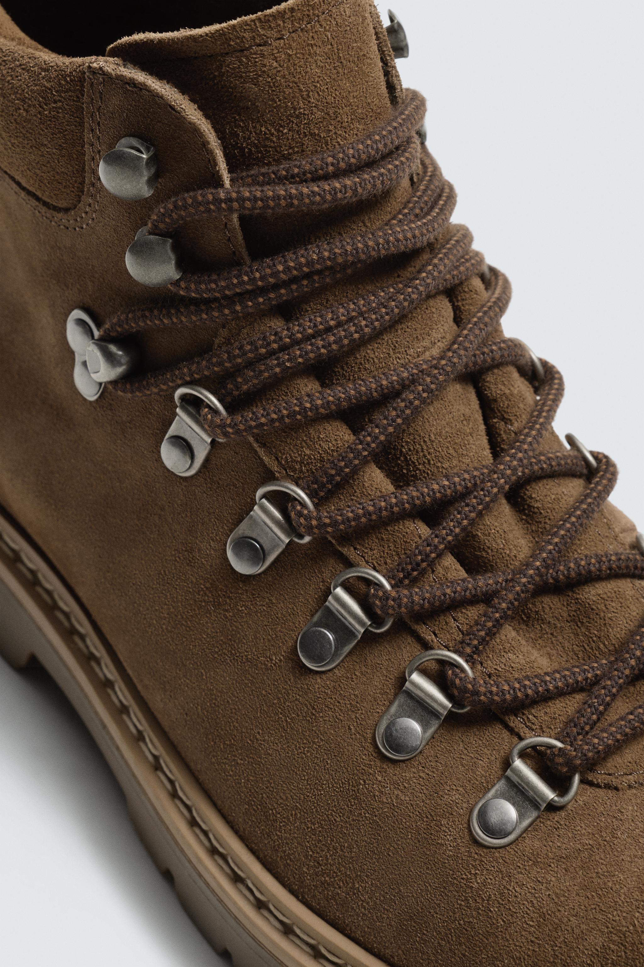 BOTTES EN CUIR À SEMELLES ÉPAISSES