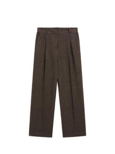 Pantalón pinzas total look melange lino - Negro oro de Zara