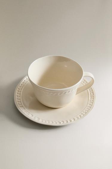 RAISED STONEWARE TEACUP AND SAUCER - Cream by Zara - Image 1