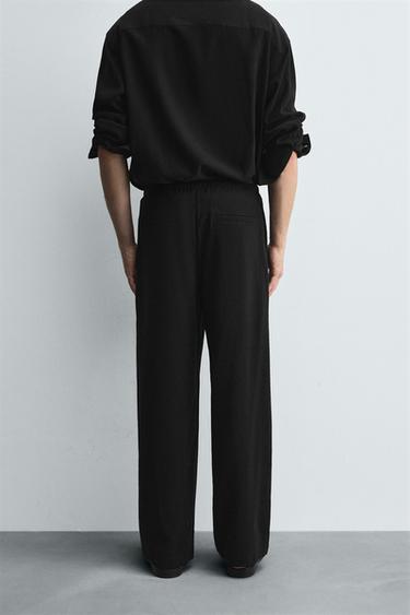 RELAXED FIT FLOWING TROUSERS - Black by Zara - Image 2