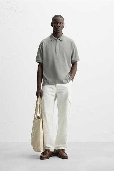POLO À TEXTURE AVEC ZIP - Vert clair de Zara - Image 0