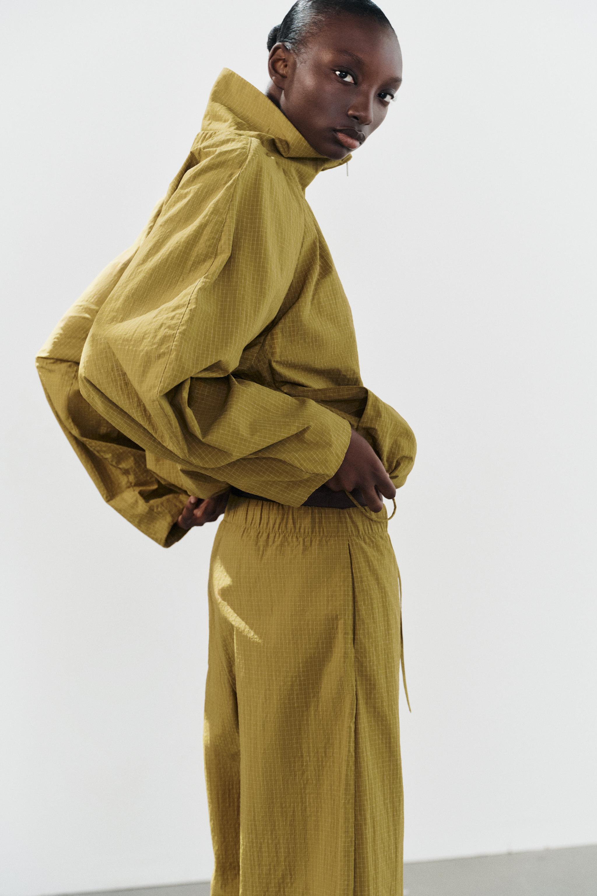 VESTE PLIS TISSU TECHNIQUE
