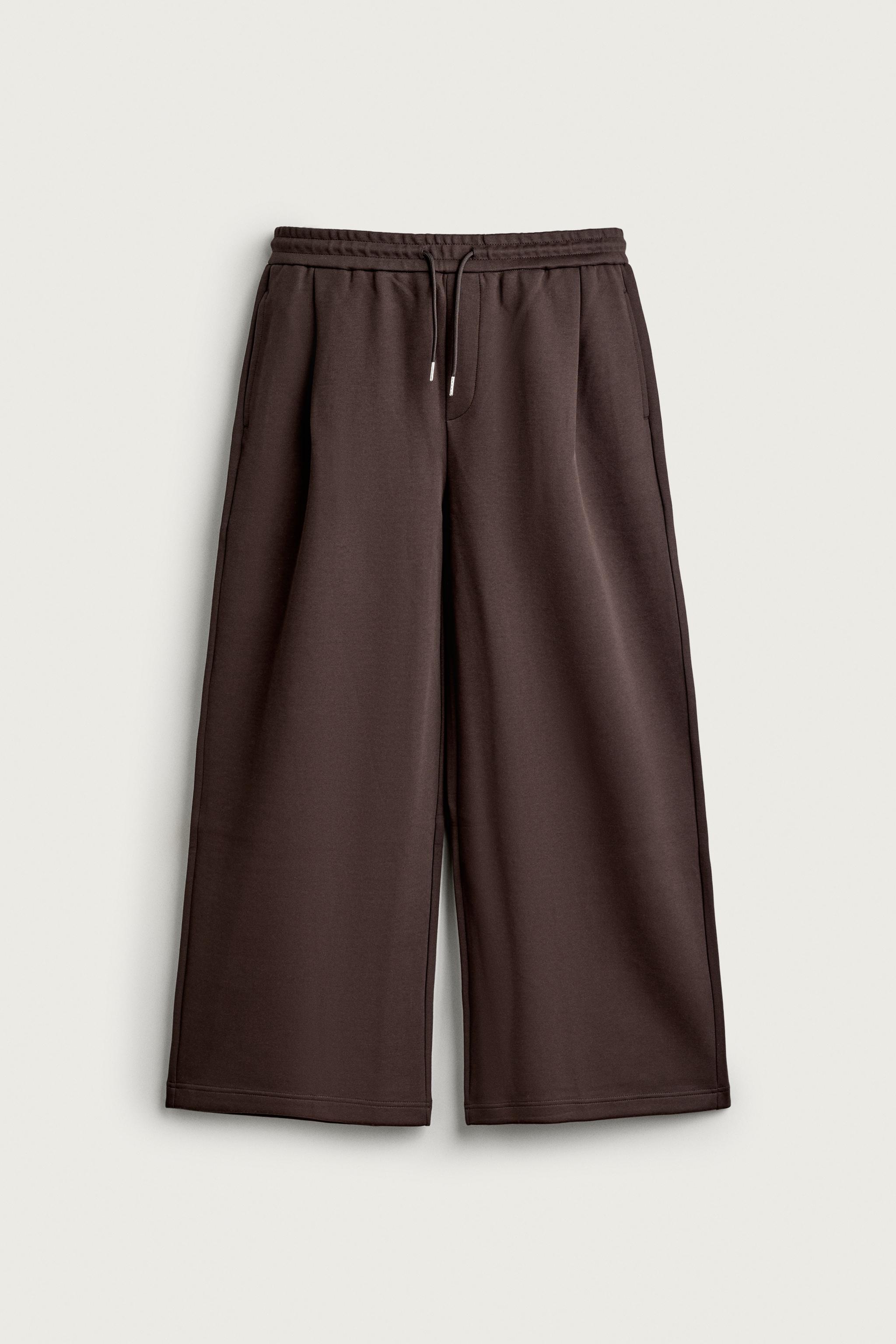 PLEATED BALLOON-FIT PANTS