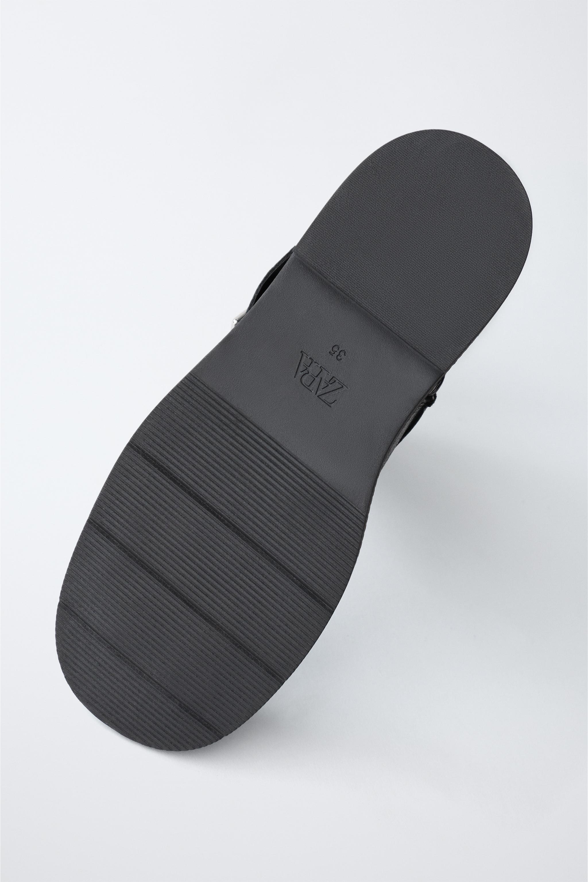 BUCKLED LEATHER BOOTS