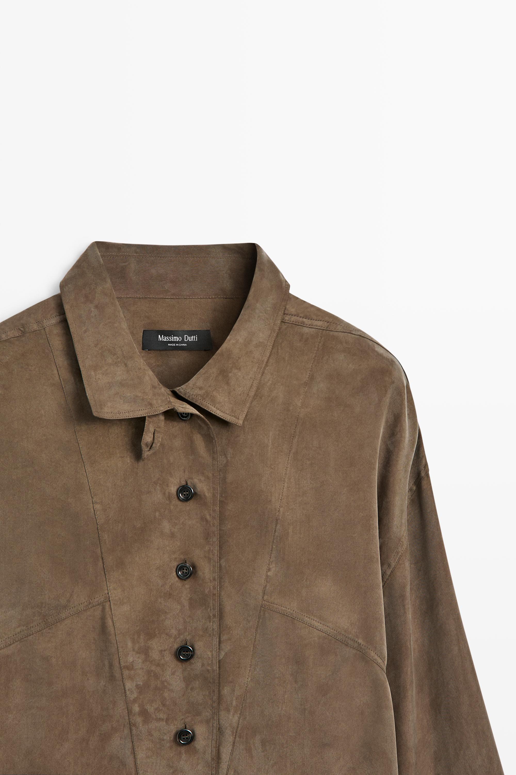 Flowing shirt with stand collar and bib detail