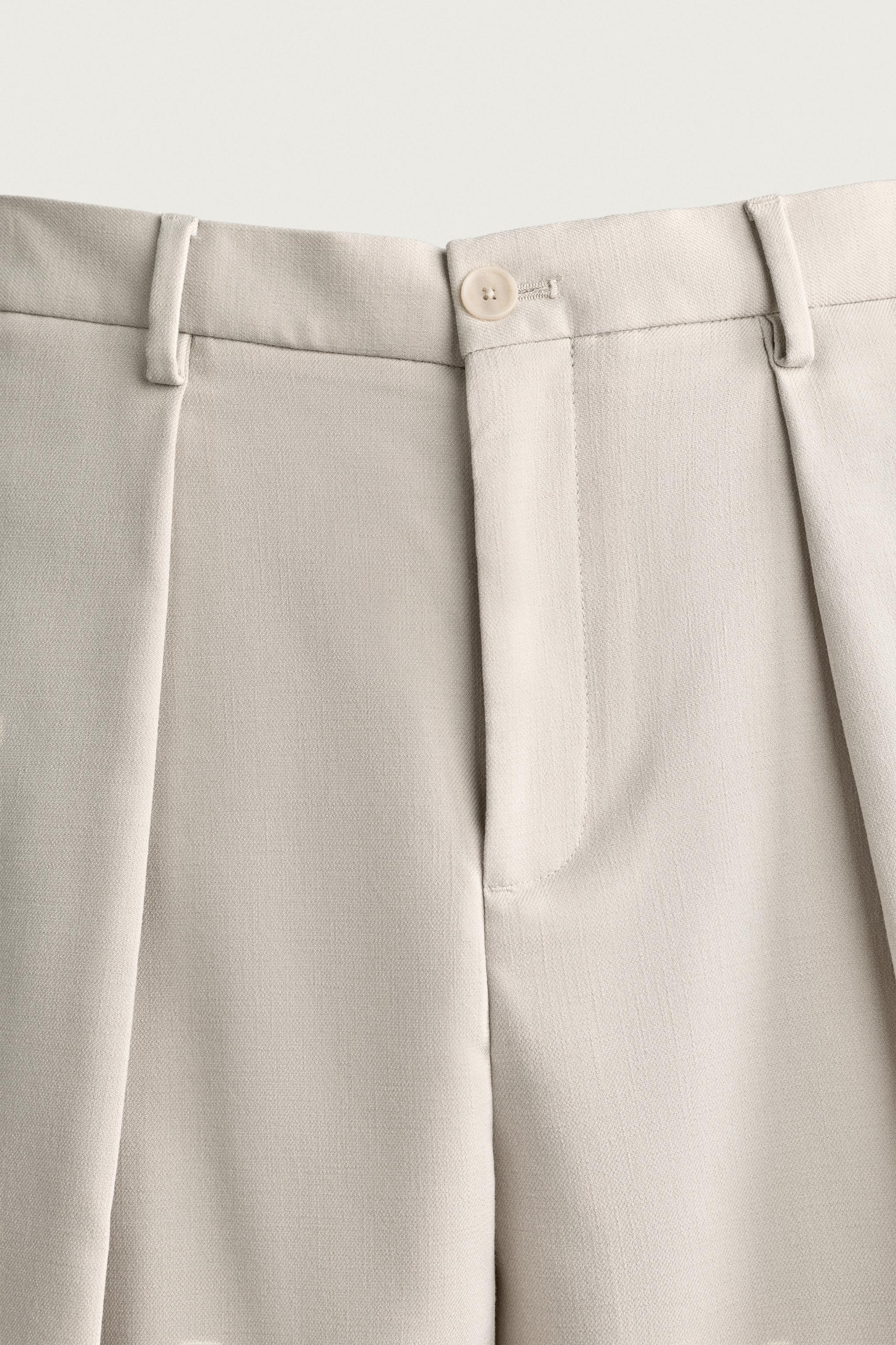 WIDE FIT PLEATED SHORTS