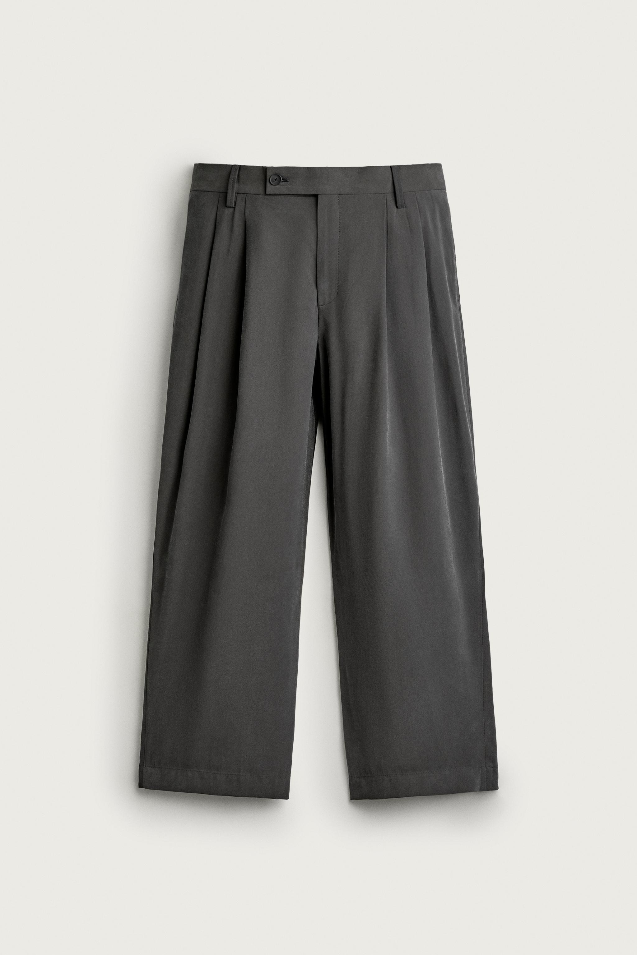 RELAXED FIT PLEATED PANTS