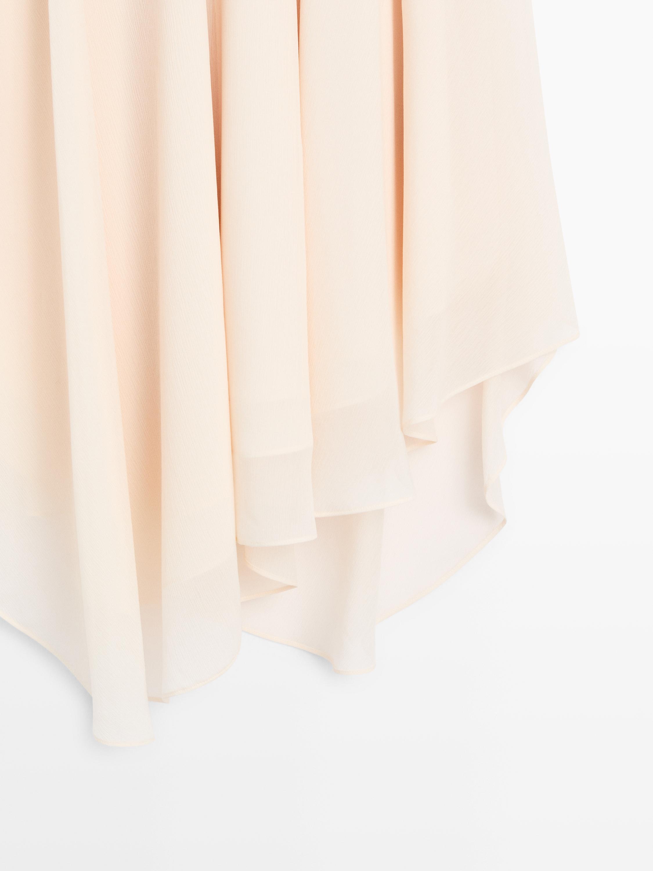 Flowing asymmetric midi skirt