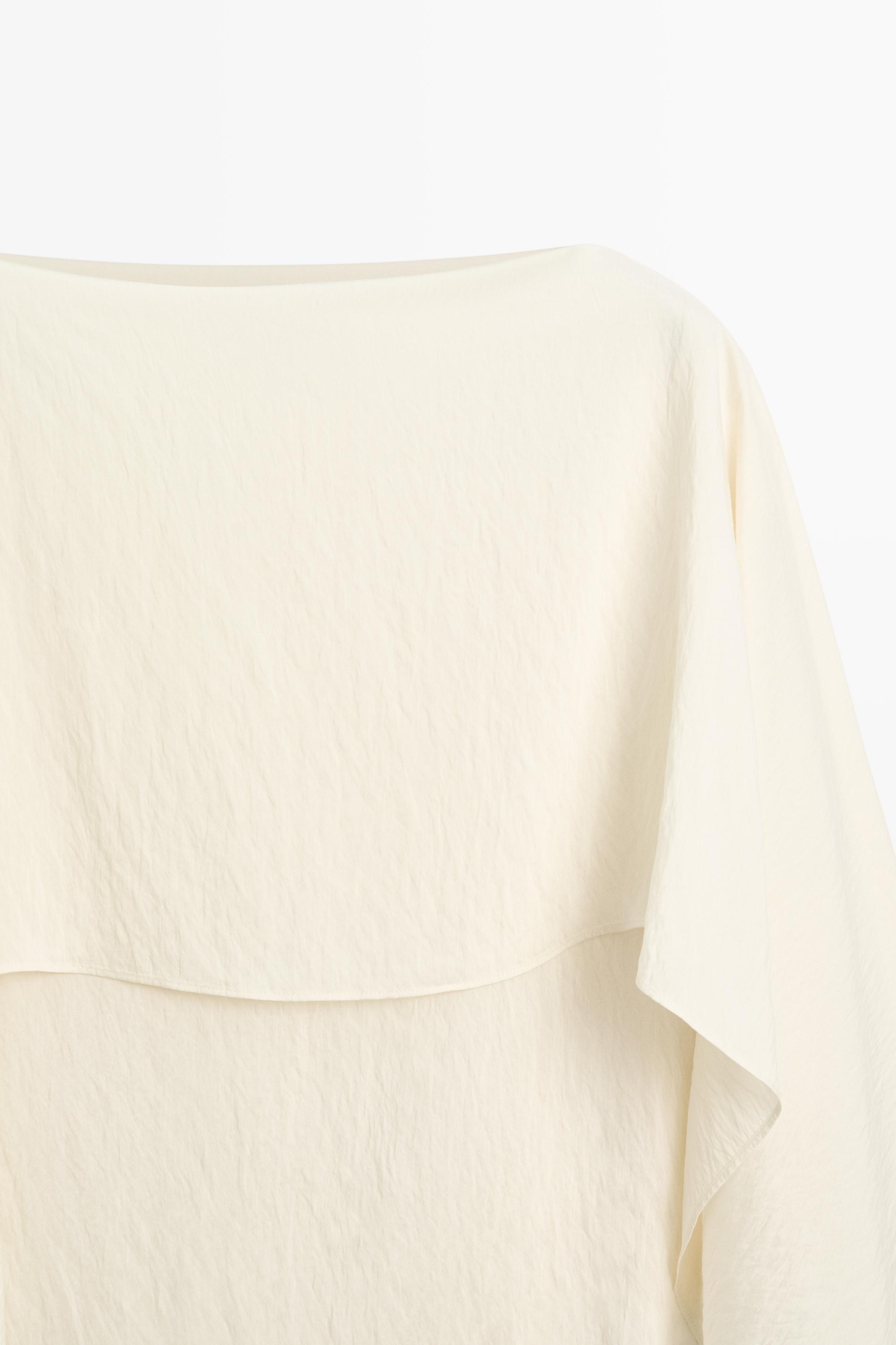 Blouse fluide style cape