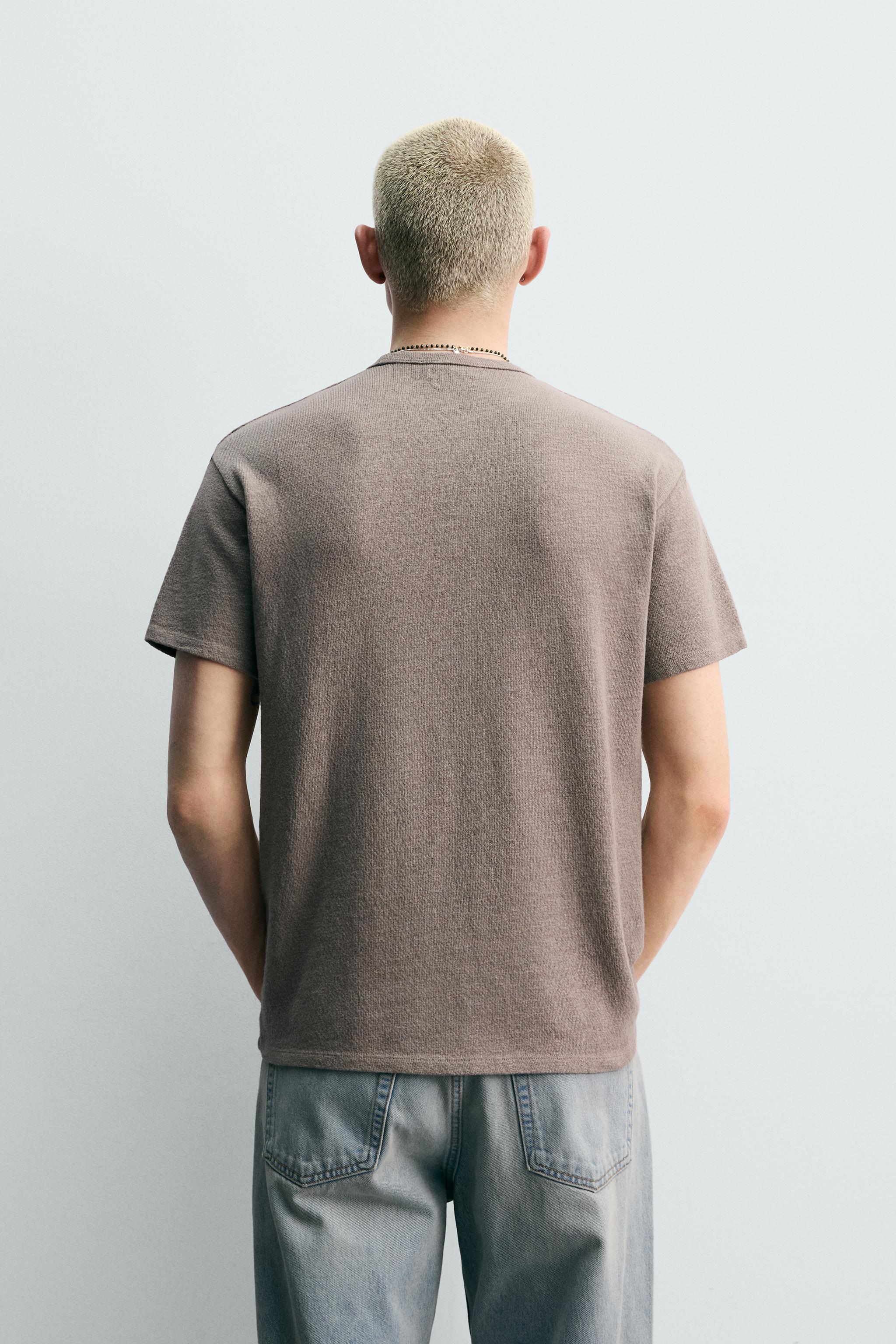 T-SHIRT EN MAILLE LAVÉE À PIÈCES