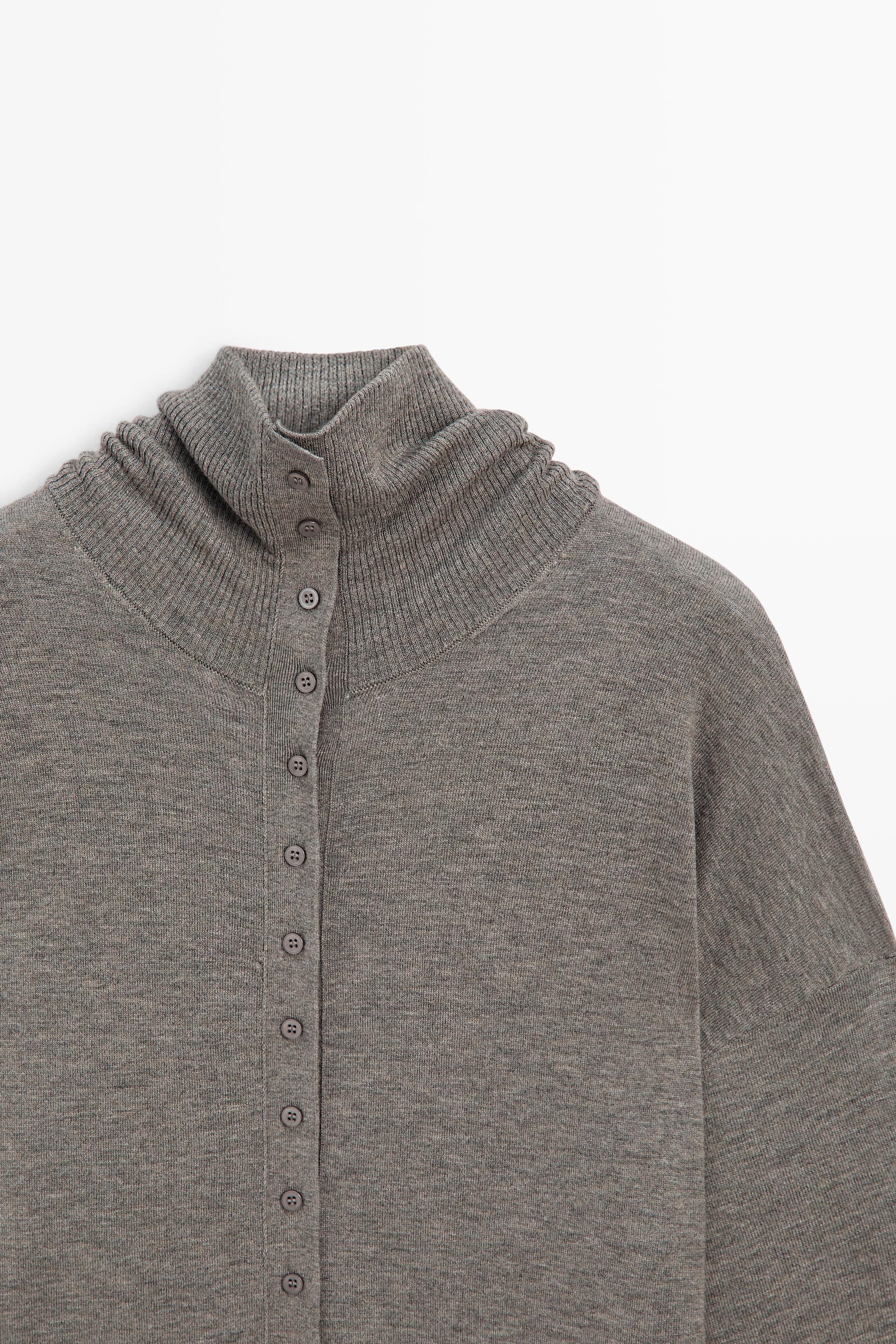 Turtleneck cardigan with button detail