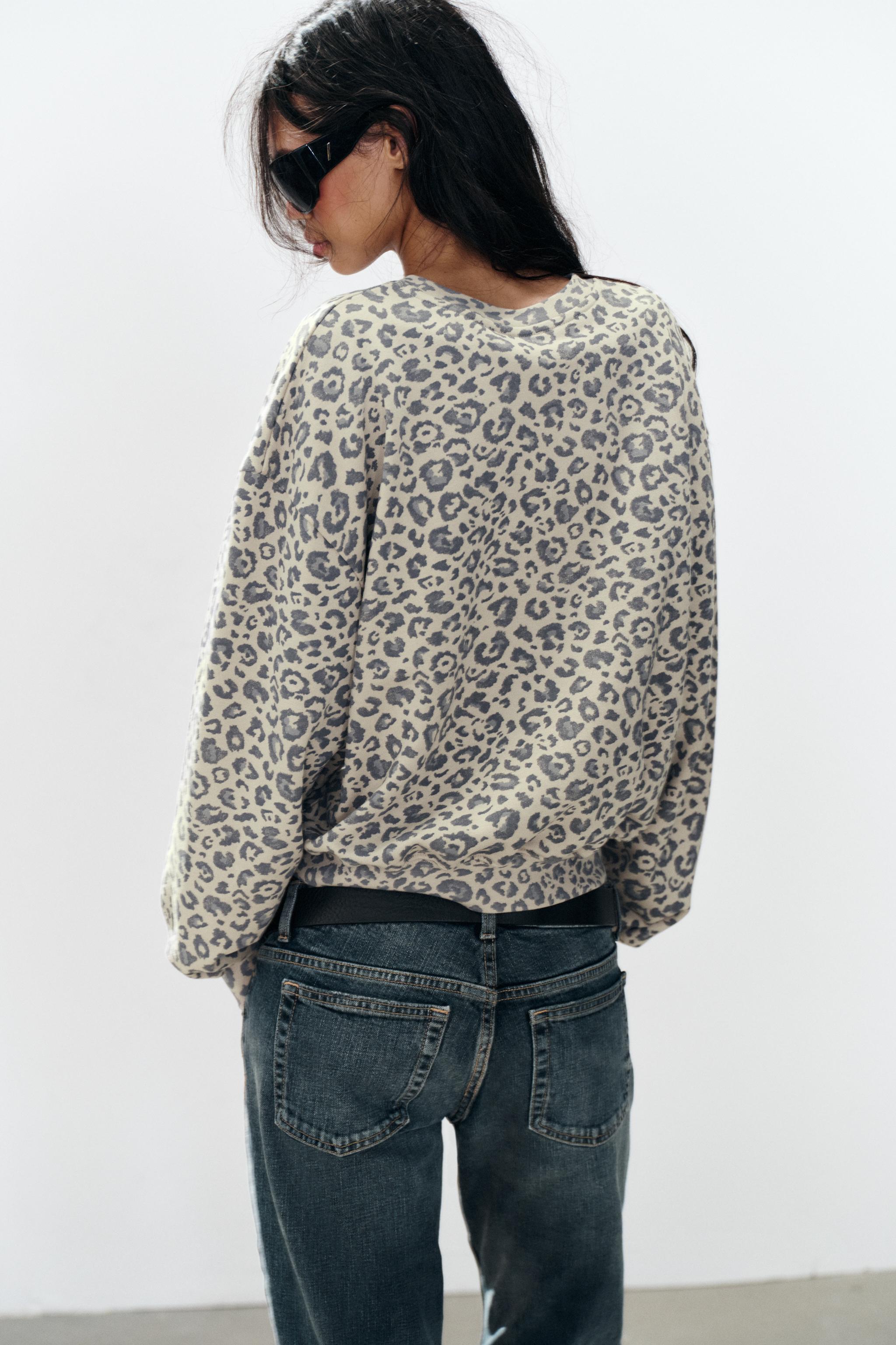 ANIMAL PRINT SWEATSHIRT