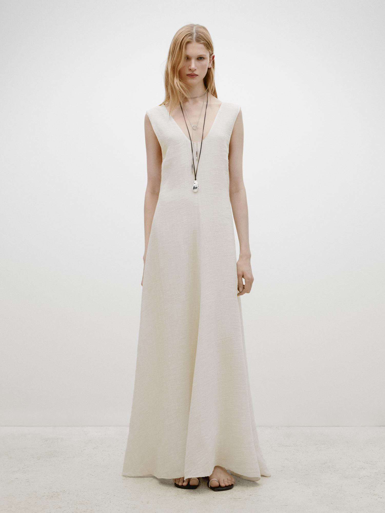 Long textured dress with V-neckline - Limited Edition