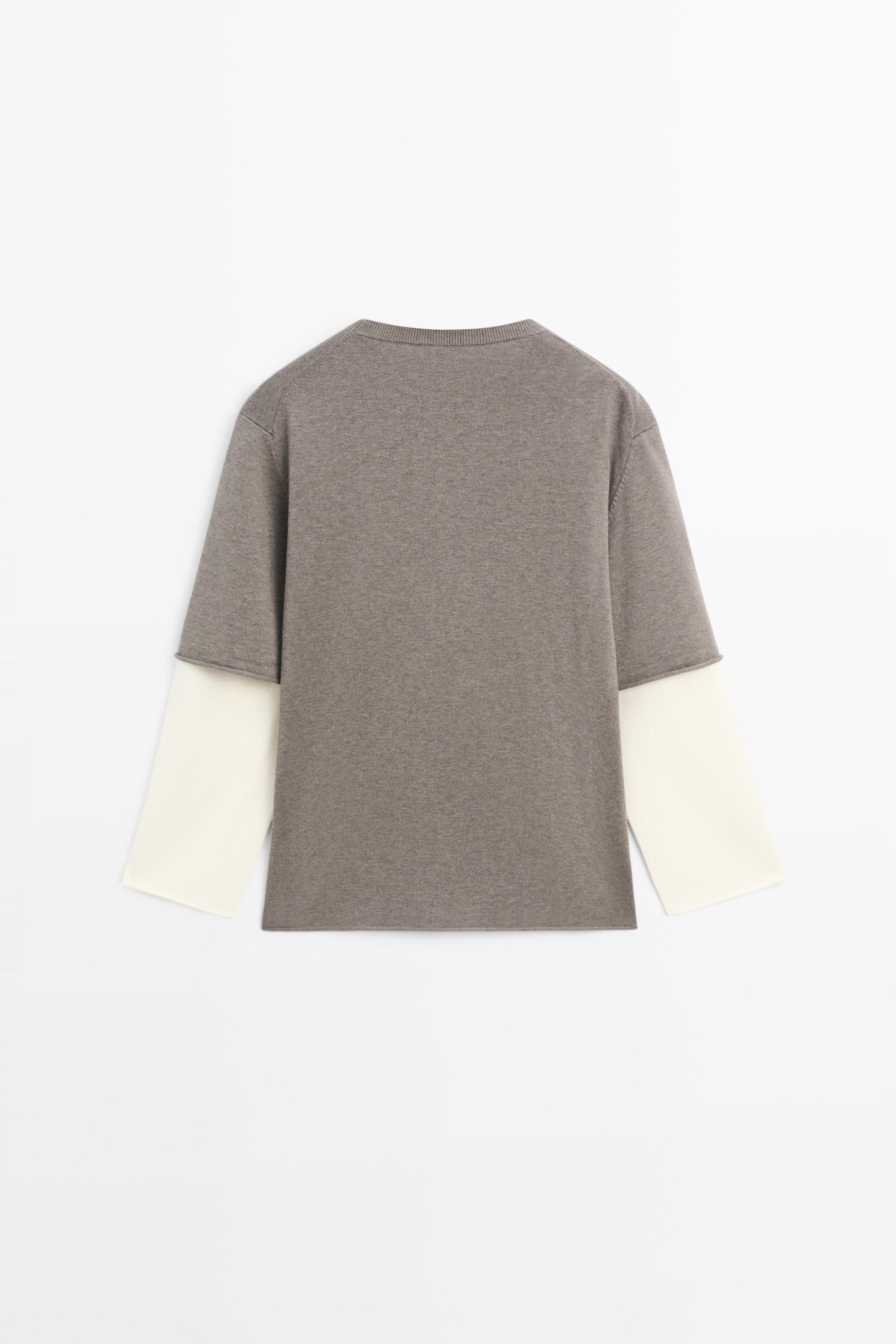 Oversize knit sweater with double sleeve detail