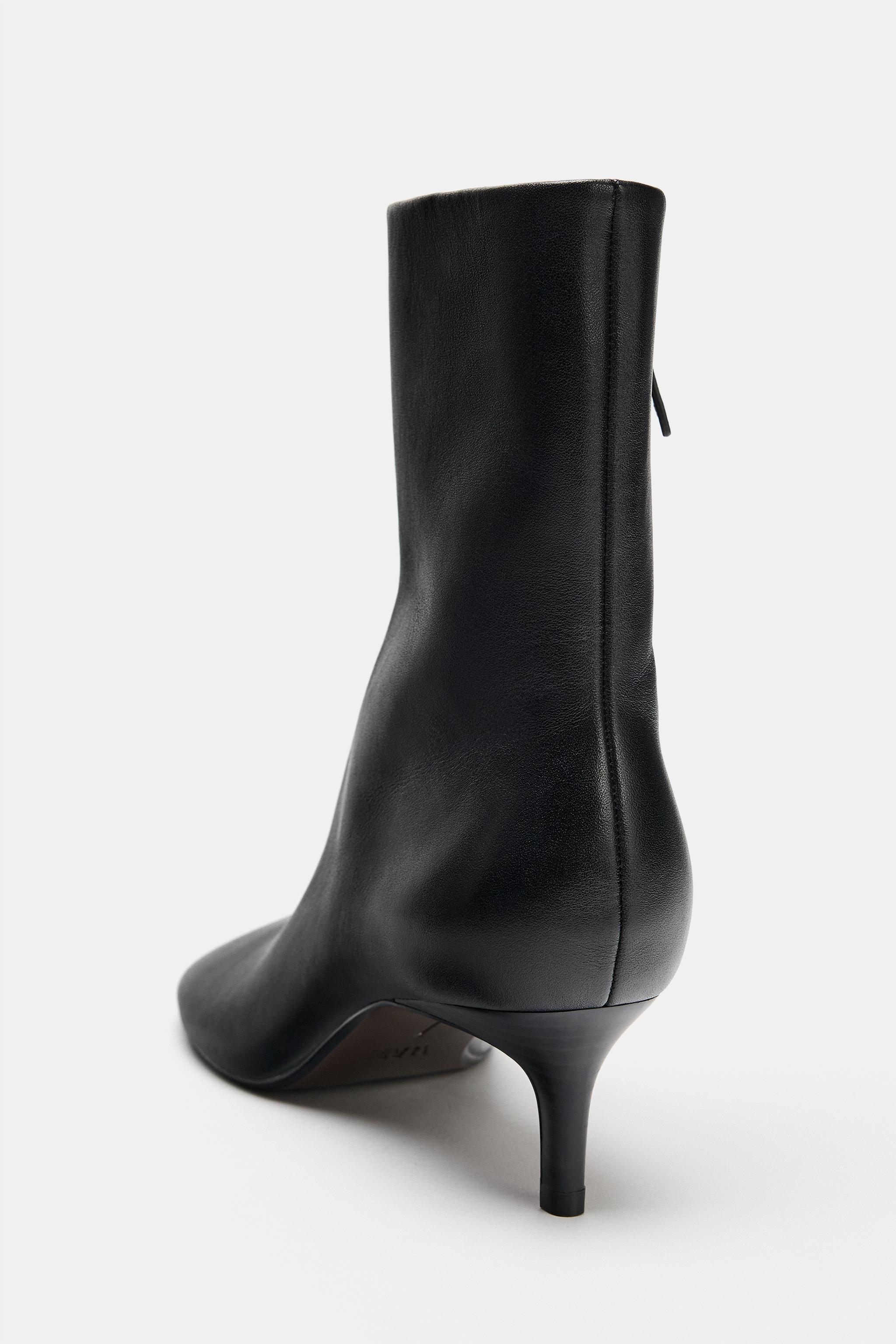 BOTTINES À TALONS EN CUIR