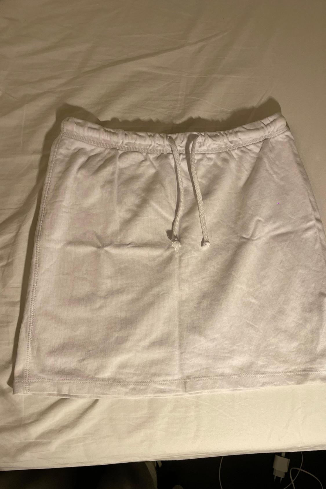 MINI SKIRT WITH CORDS