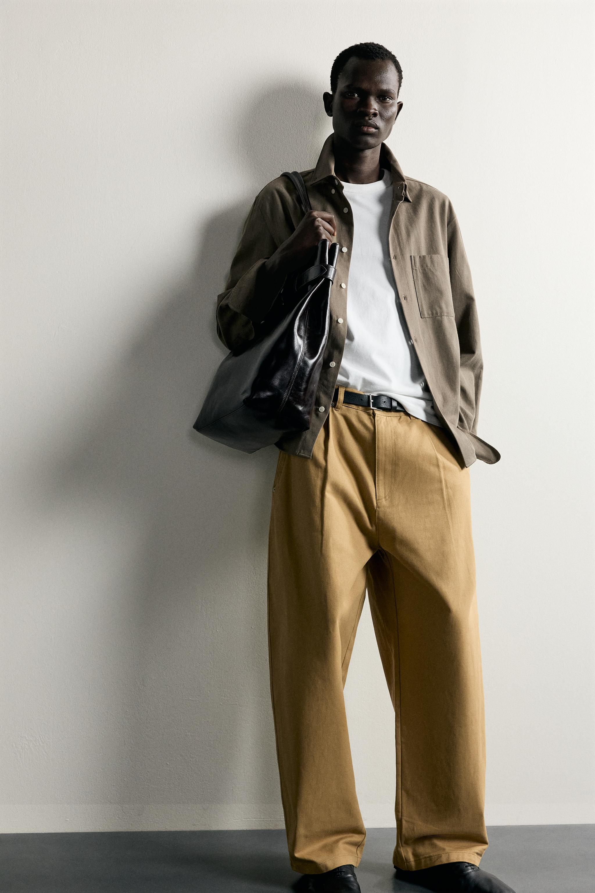 PANTALON À PLIS COUPE BARREL
