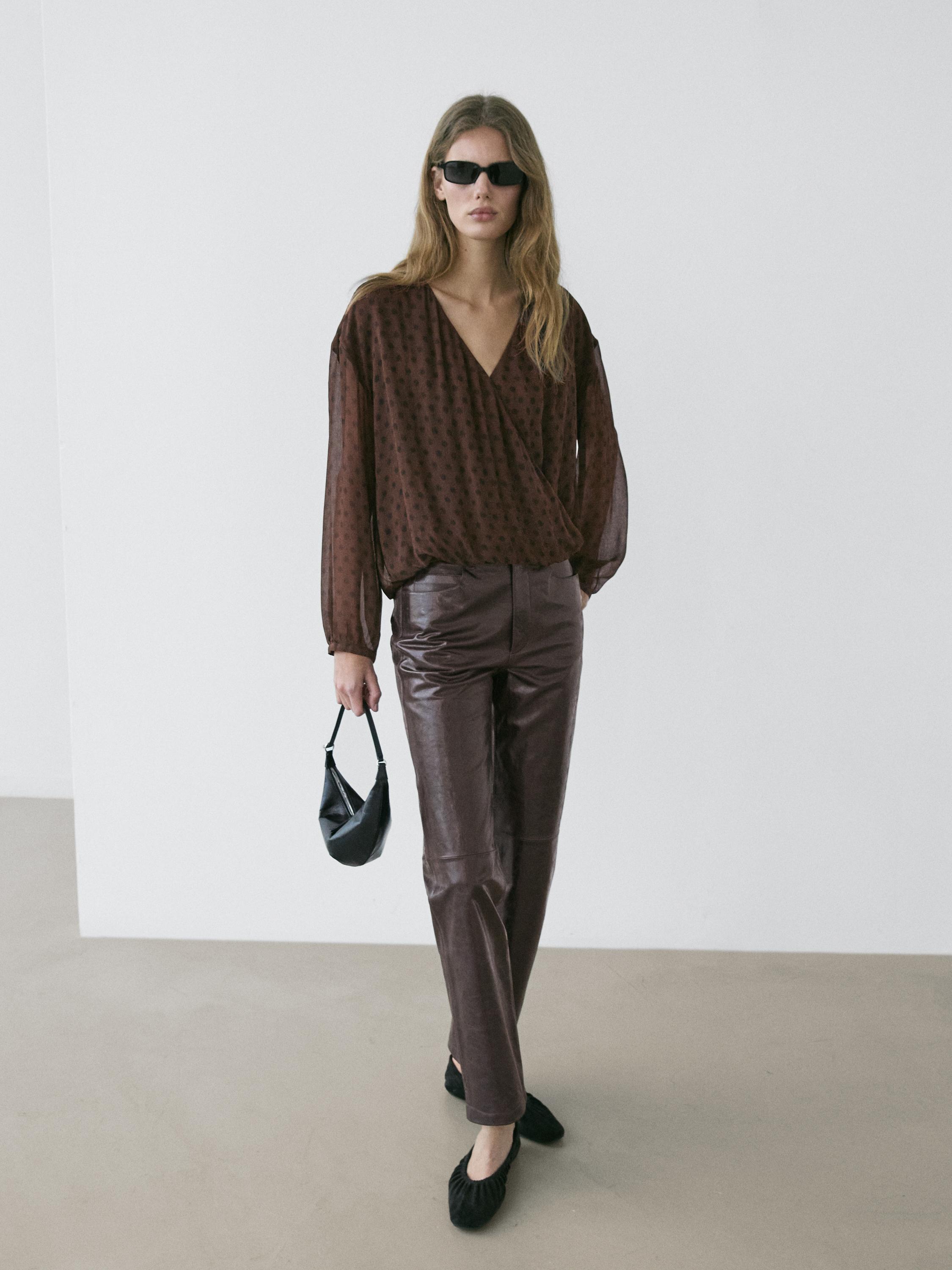 Flowing surplice polka dot blouse