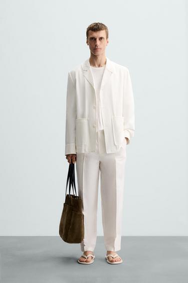 PANTALÓN FLUIDO PLIEGUES - Blanco de Zara - Imagen 0