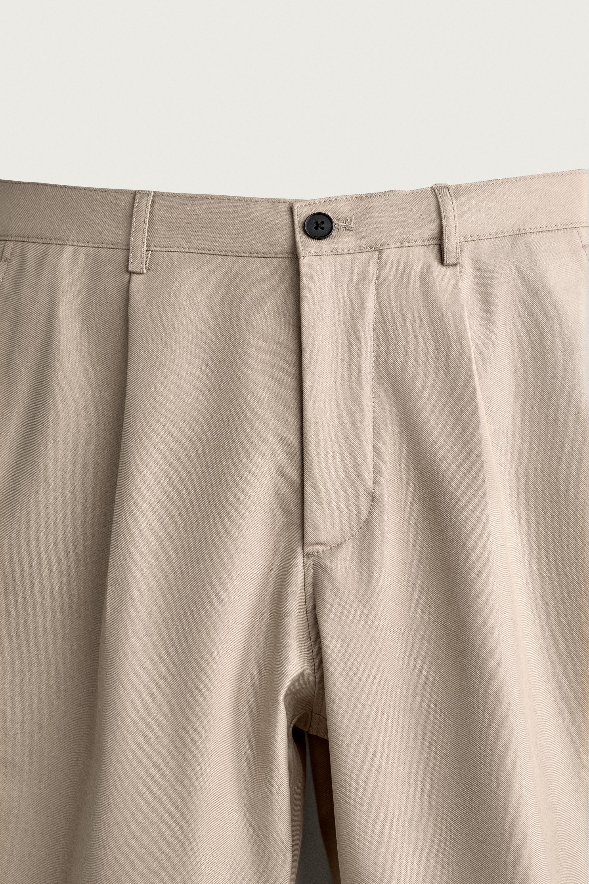 STRAIGHT FIT PLEATED PANTS