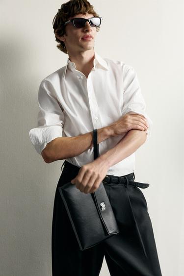 CLUTCH WITH METAL FASTENING - Black by Zara - Image 0