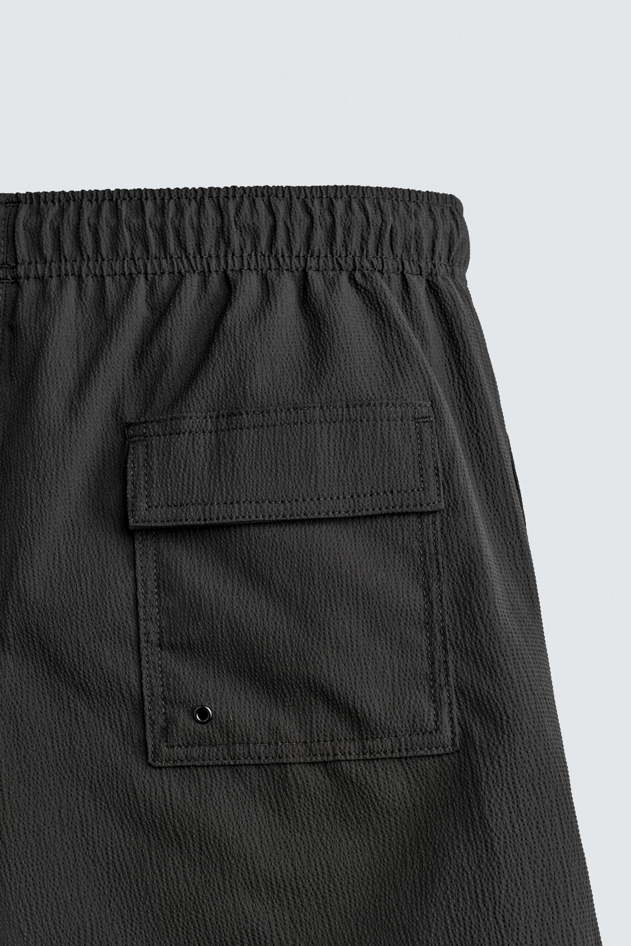 TEXTURED MID-LENGTH SWIMSUIT