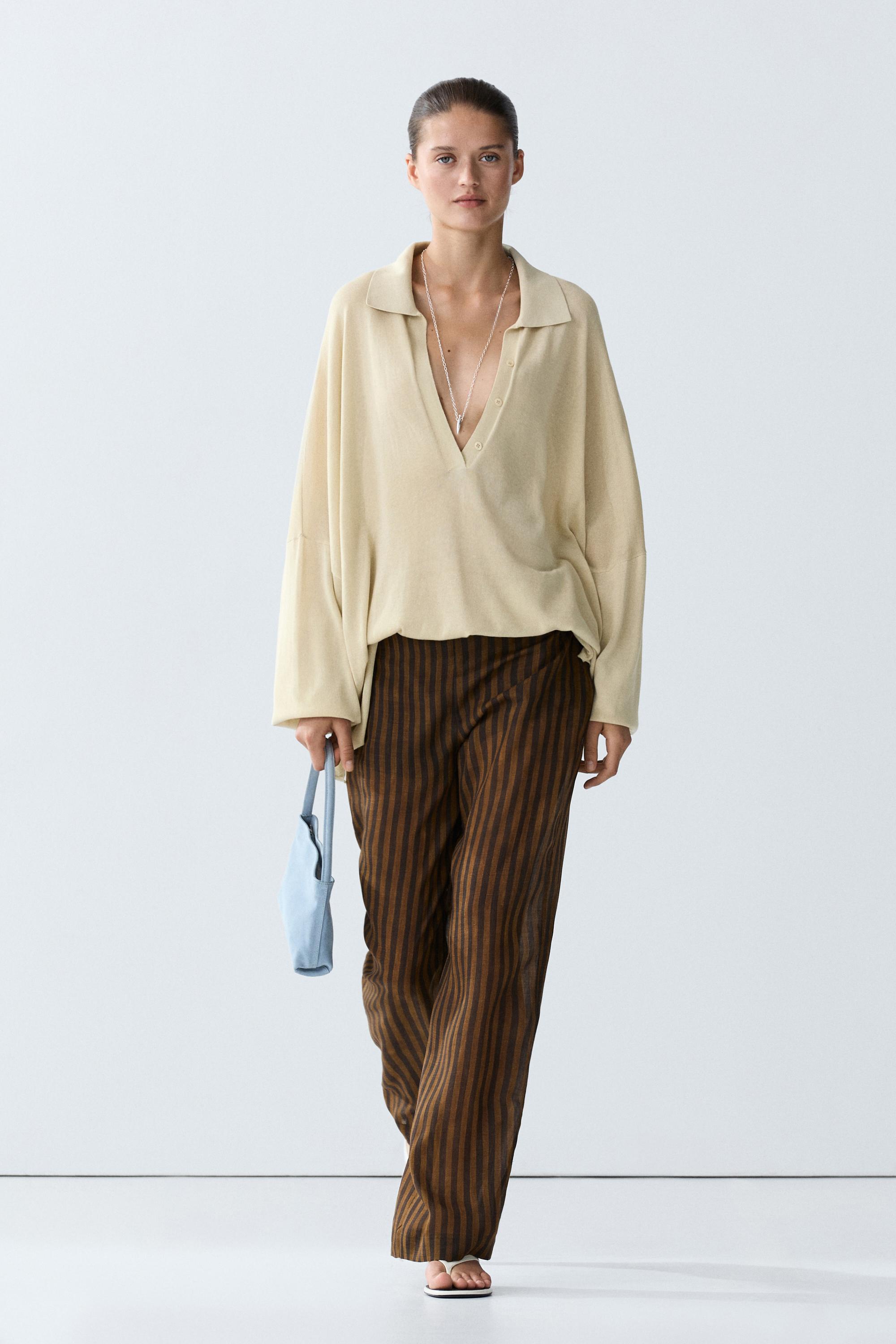 Total look flowing striped pants with button hem — Dark khaki