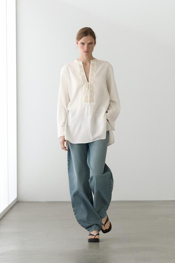 Flowing oversize blouse with stand collar and embroidery from Zara - $160