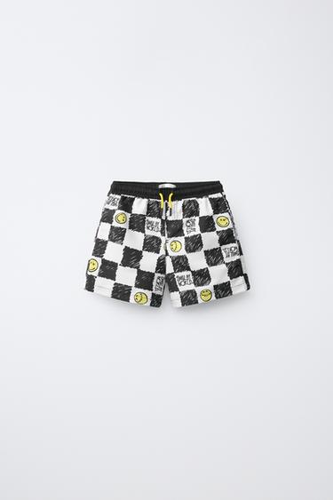 6-14 AÑOS/ BERMUDA BAÑO CUADRO DAMERO SMILEYWORLD ® - negro/amarillo de Zara