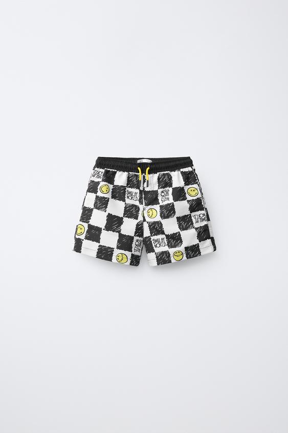 6-14 AÑOS/ BERMUDA BAÑO CUADRO DAMERO SMILEYWORLD ® - negro/amarillo de Zara - Imagen 0