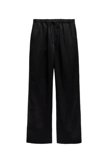 STRAIGHT FLOWING TROUSERS