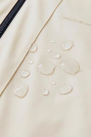 RUBBERISED WATER-REPELLENT HOODED RAINCOAT - Butter by Zara - Image 7