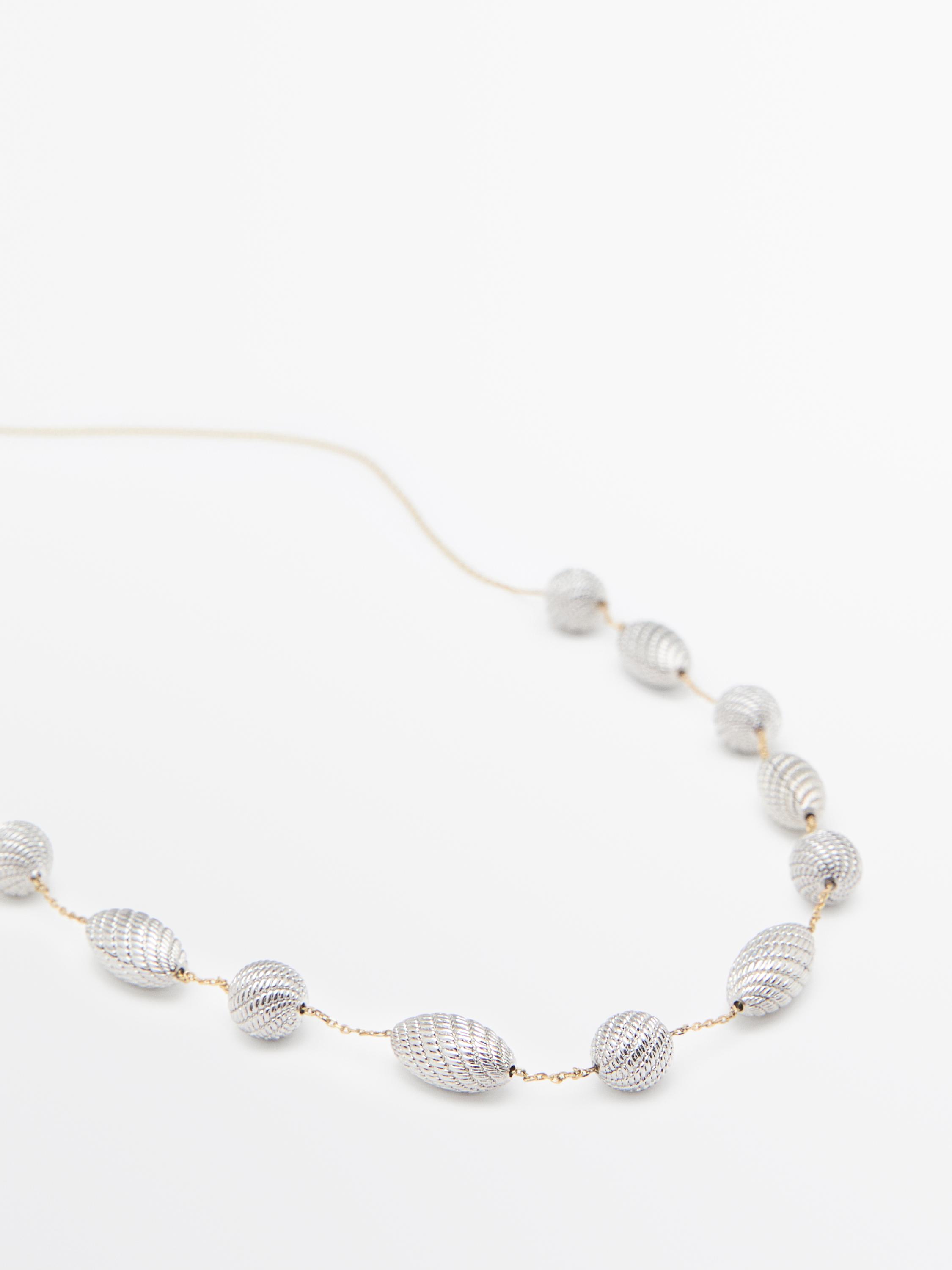 Collier texturé pièces ovales