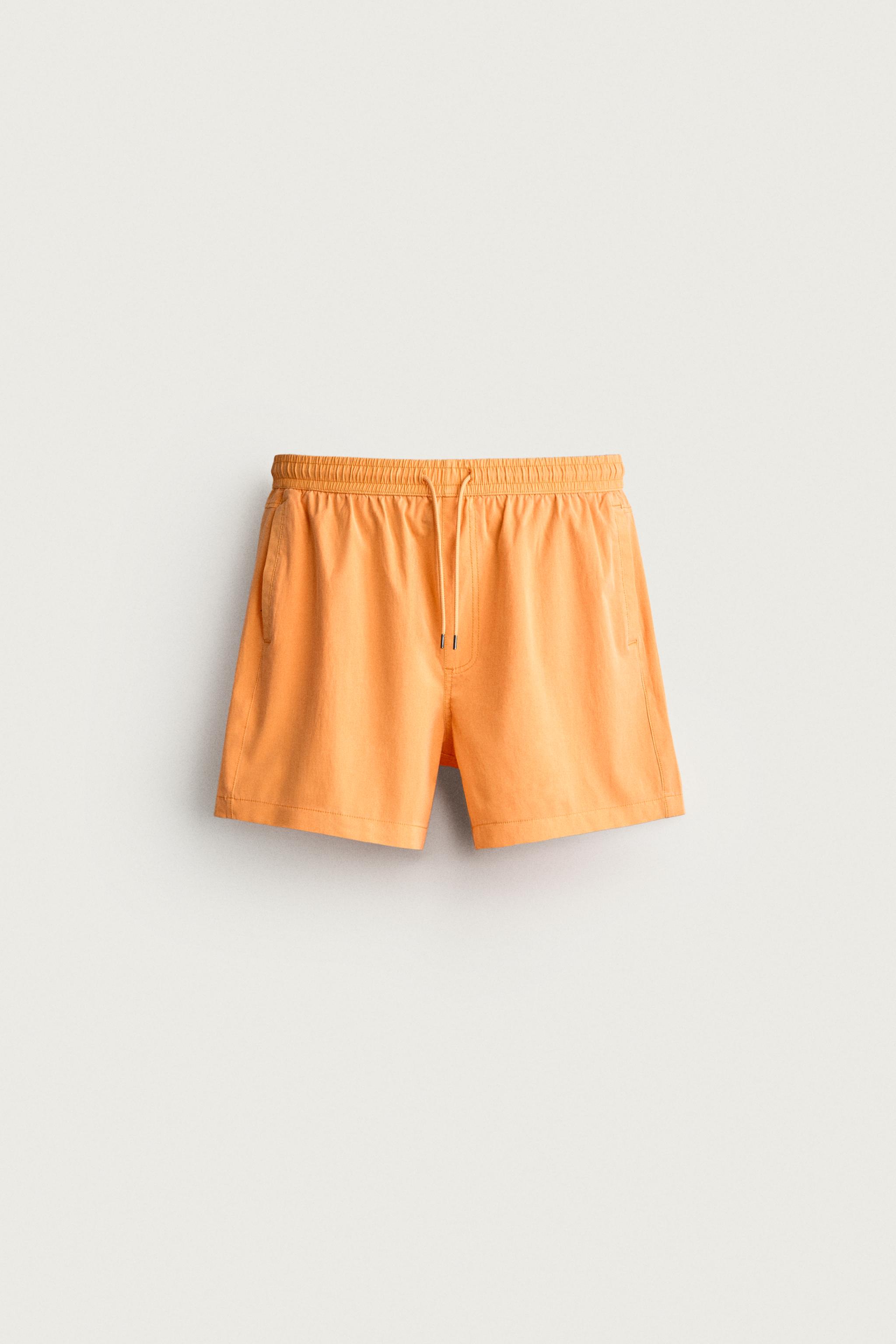 WASHED EFFECT LONG SWIM TRUNKS