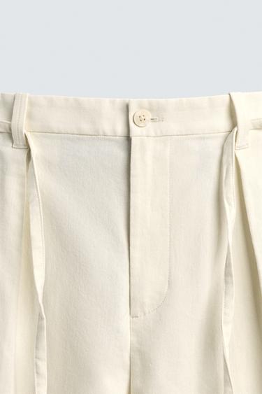 PANTALON À PLIS EN COTON ET LIN - Écru de Zara - Image 8
