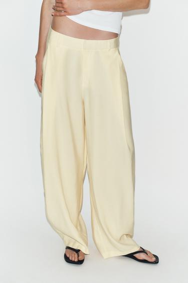 FLOWING PLEATED TROUSERS - Light yellow by Zara