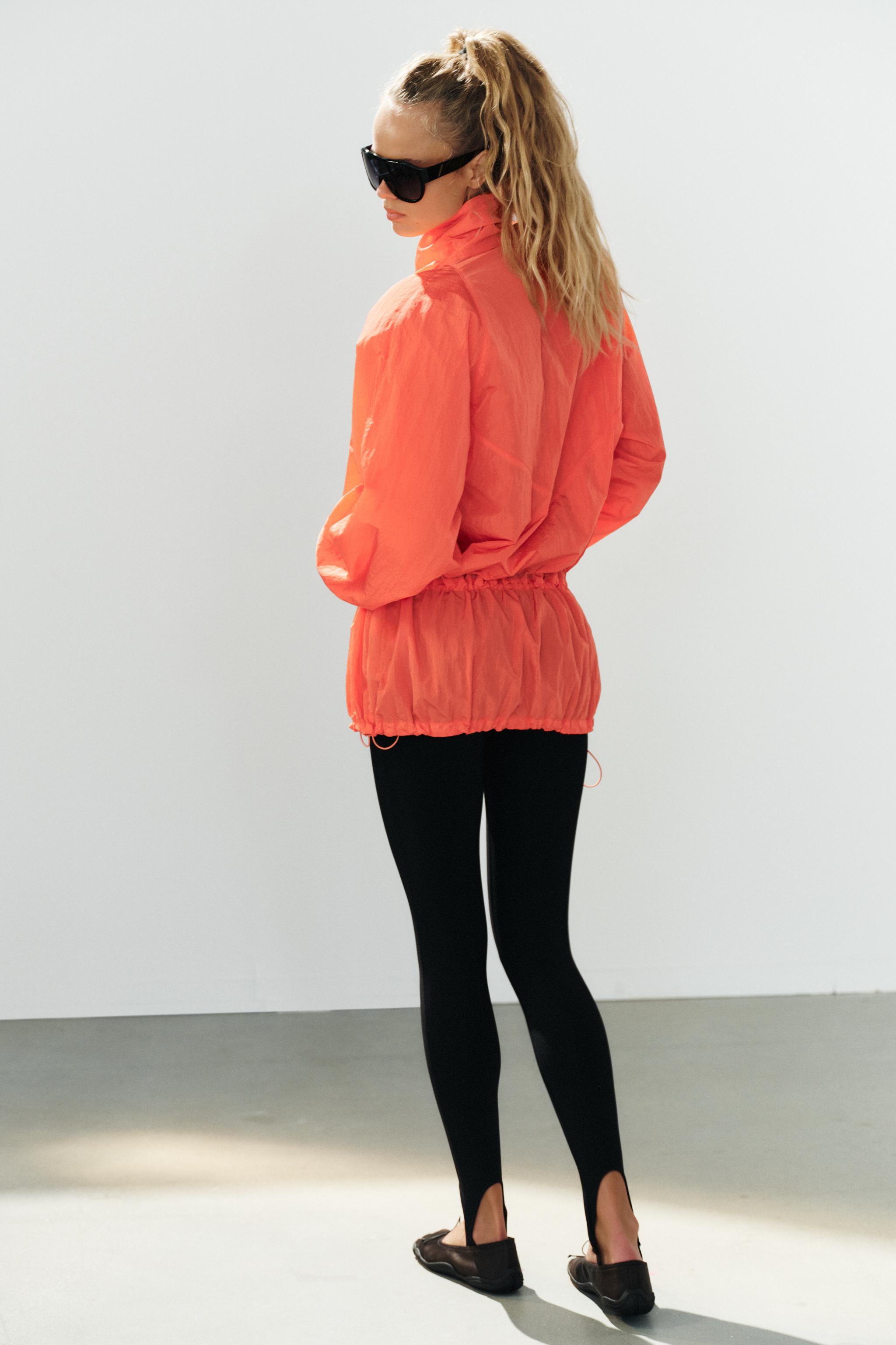NYLON JACKET WITH SHOULDER PADS AND ZIP