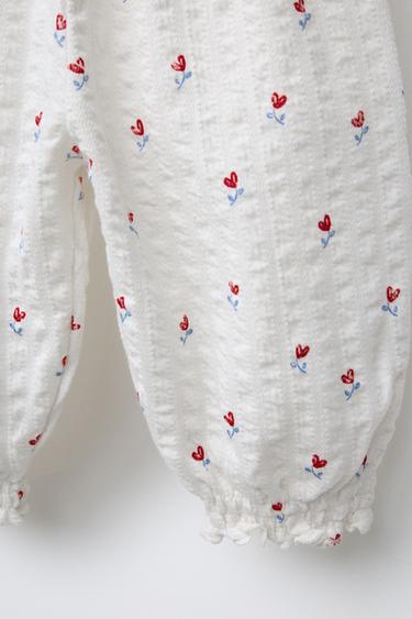 STRUKTURVÆVEDE BUKSER MED BLOMSTERPRINT - knæk. hvid fra Zara