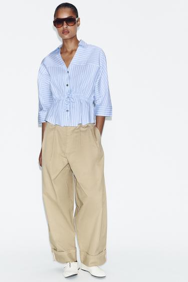 PANTALÓN PINZAS BAJO VUELTA - Camel claro de Zara