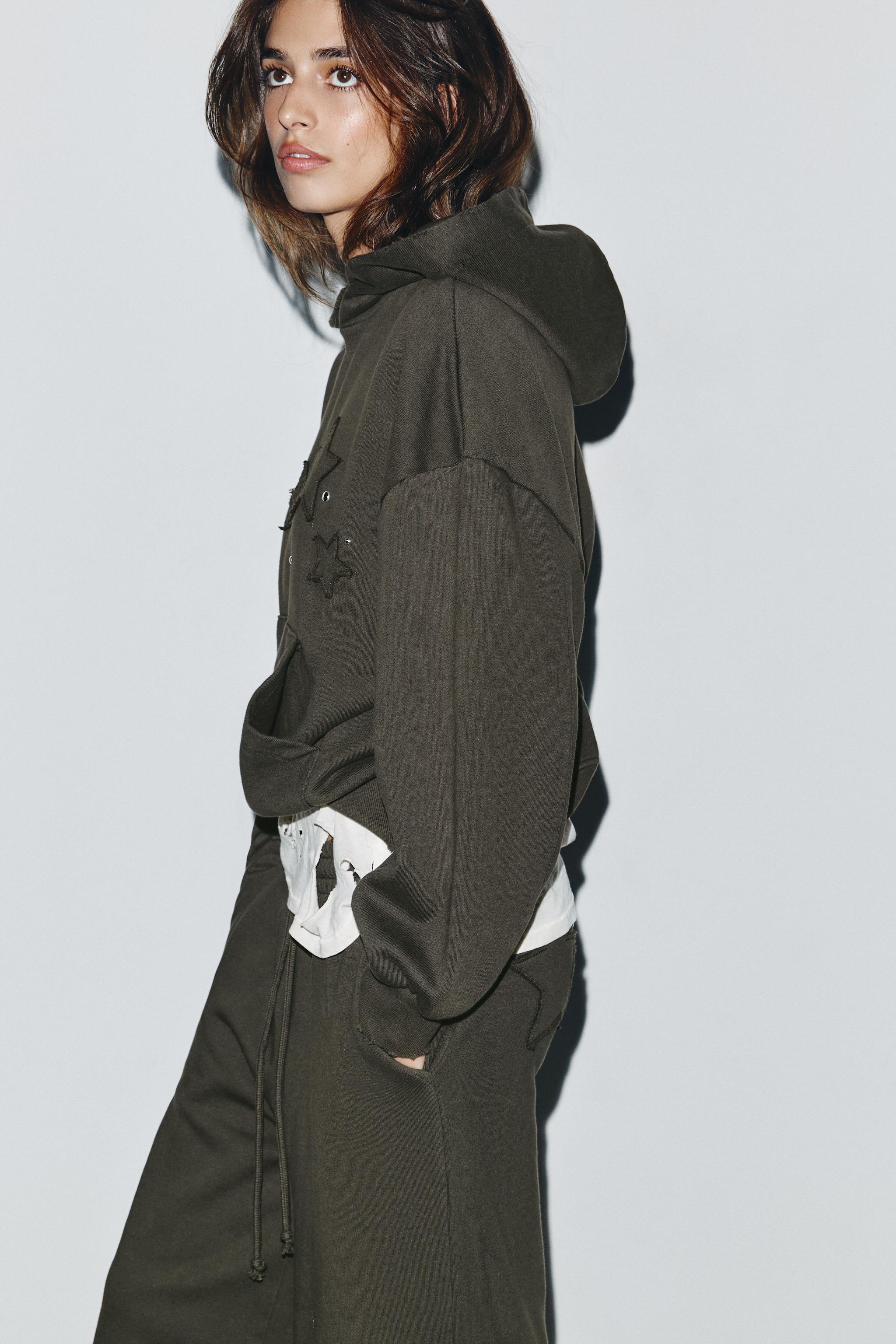 SWEAT DÉLAVÉ ÉTOILES CLOUS