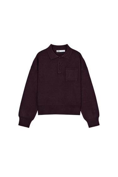 Front view of a burgundy jumper with a shirt collar, long sleeves, front patch pocket, and front buttons.
