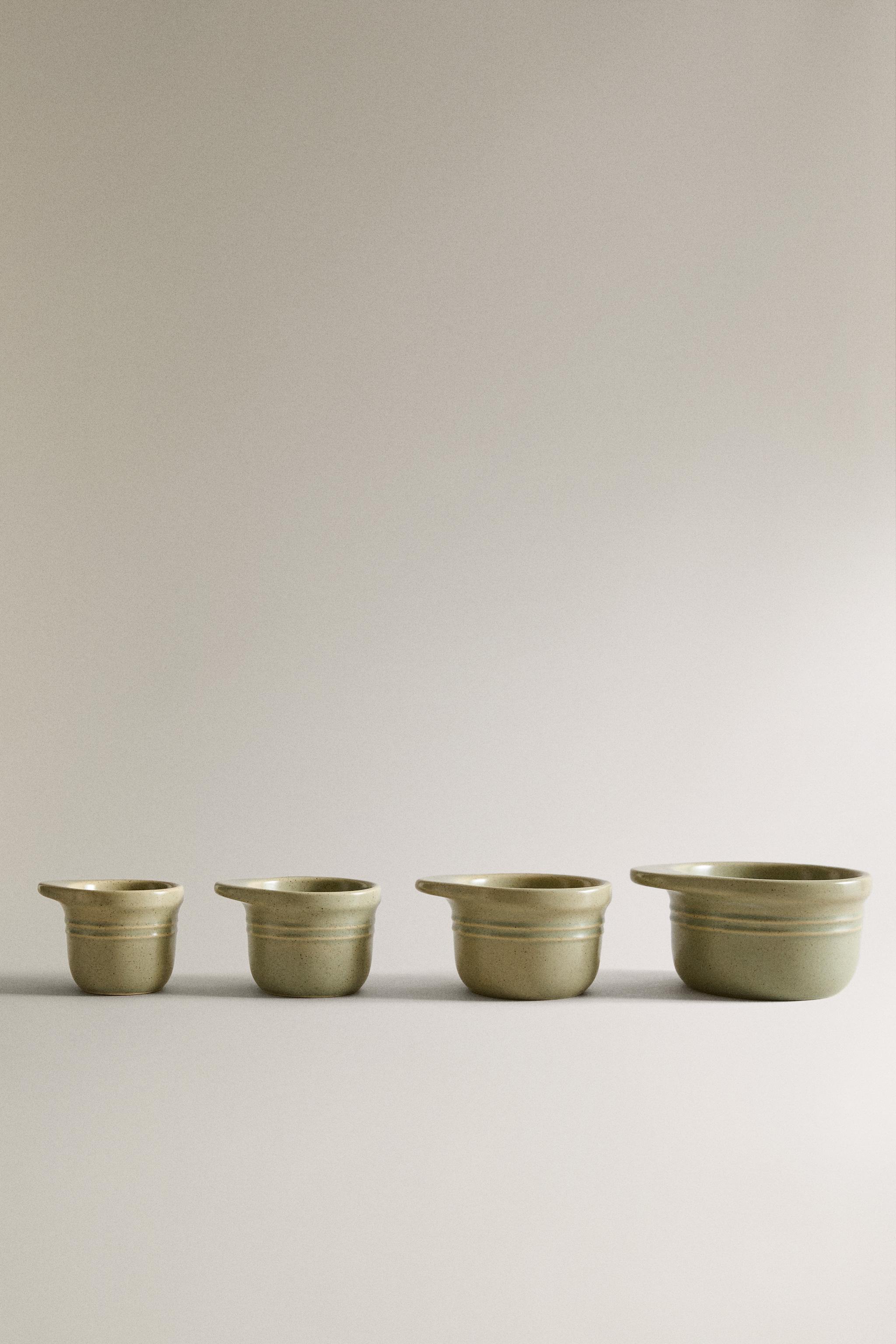 LOT DE 4 BOLS DOSEURS EN GRÈS