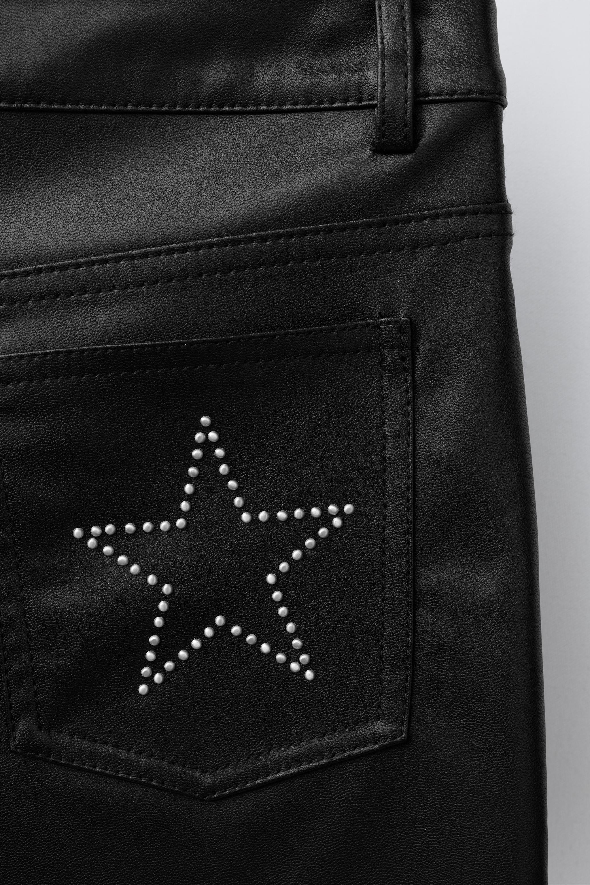 FAUX LEATHER FLARE PANTS WITH STUDS