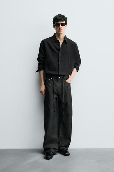 RELAXED FLARE FIT JEANS - Black by Zara - Image 0