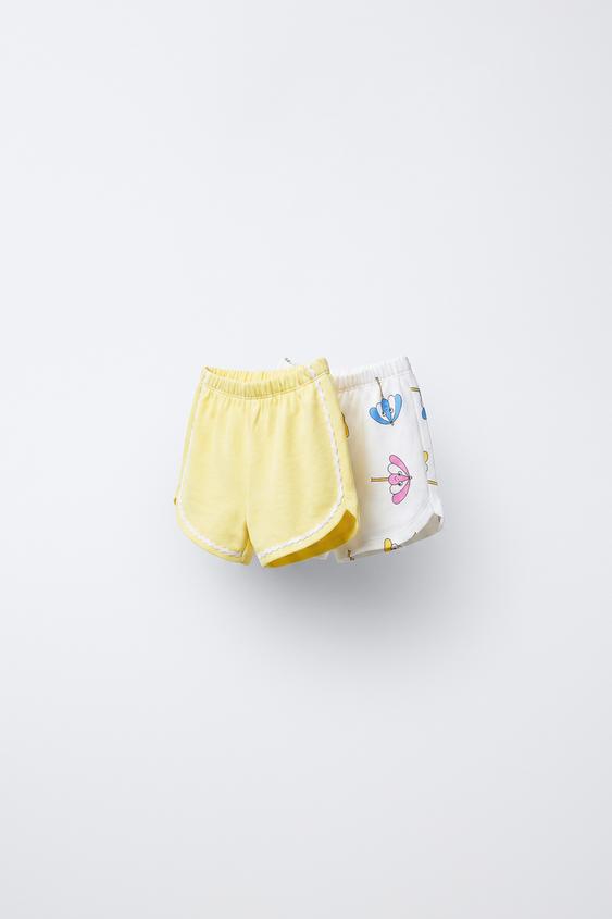 SET VAN TWEE BERMUDA'S MET STRANDPARAFLU'S EN GOLVEN - Print van Zara - Afbeelding 0